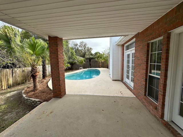 287 Stahlman Ave, Destin, FL 32541 - view of pool featuring a fenced in pool, a patio, a fenced backyard, and french doors