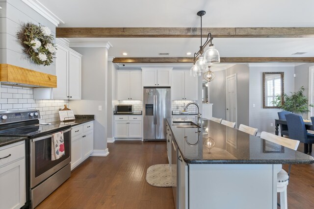 862 Bay Grove Rd, Freeport, FL 32439 - kitchen featuring a sink, beamed ceiling, appliances with stainless steel finishes, crown molding, and a breakfast bar area