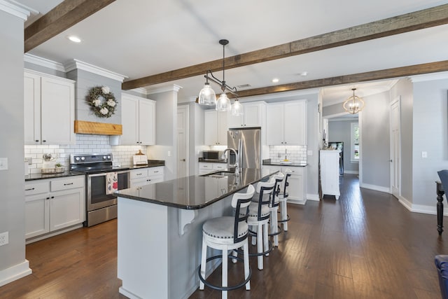 862 Bay Grove Rd, Freeport, FL 32439 - kitchen featuring dark countertops, crown molding, beamed ceiling, backsplash, and appliances with stainless steel finishes