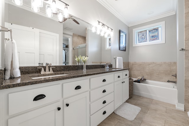 862 Bay Grove Rd, Freeport, FL 32439 - bathroom featuring double vanity, a garden tub, ornamental molding, and a sink