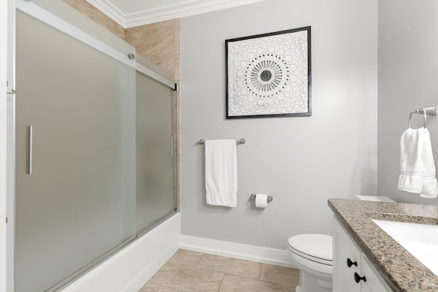 862 Bay Grove Rd, Freeport, FL 32439 - bathroom with tile patterned flooring, toilet, vanity, baseboards, and bath / shower combo with glass door