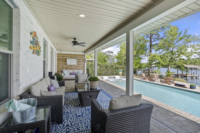 862 Bay Grove Rd, Freeport, FL 32439 - view of patio with ceiling fan, outdoor lounge area, an outdoor pool, and a water view