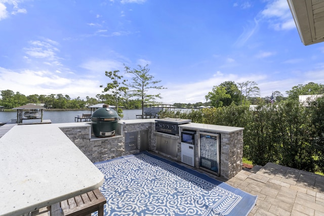 862 Bay Grove Rd, Freeport, FL 32439 - view of patio featuring grilling area, a dock, a water view, and area for grilling