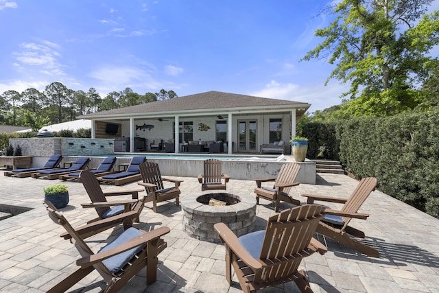 862 Bay Grove Rd, Freeport, FL 32439 - view of patio / terrace with a fire pit, french doors, an outdoor pool, and ceiling fan
