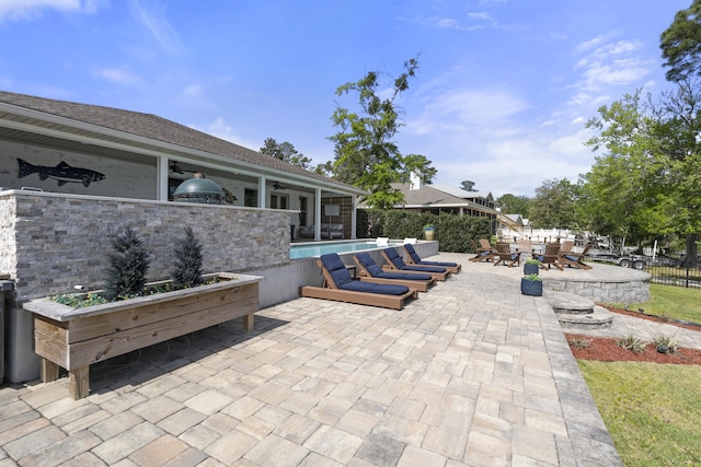 862 Bay Grove Rd, Freeport, FL 32439 - view of patio / terrace with fence, a fenced in pool, and a ceiling fan
