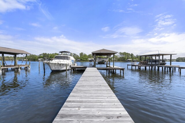 862 Bay Grove Rd, Freeport, FL 32439 - view of dock with boat lift and a water view
