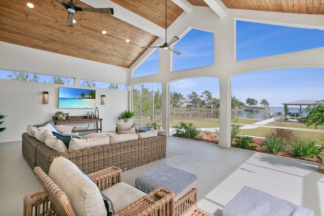 sunroom featuring an outdoor living space, ceiling fan, high vaulted ceiling, and wooden ceiling
