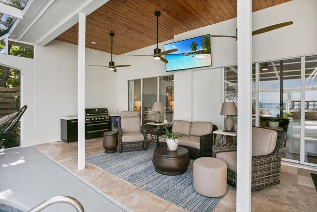 view of patio with a grill, an outdoor living space, and ceiling fan