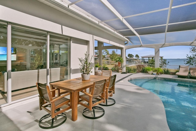 outdoor pool featuring a patio and a lanai