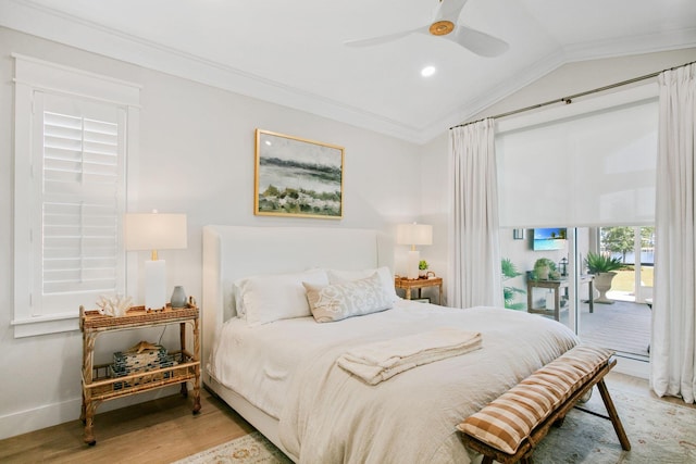 bedroom featuring lofted ceiling, light wood-type flooring, ornamental molding, baseboards, and access to exterior