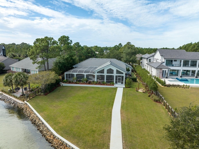 drone / aerial view with a water view