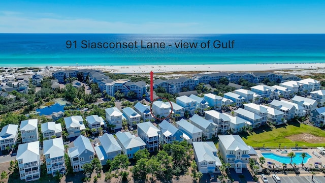 aerial view featuring a beach view and a water view