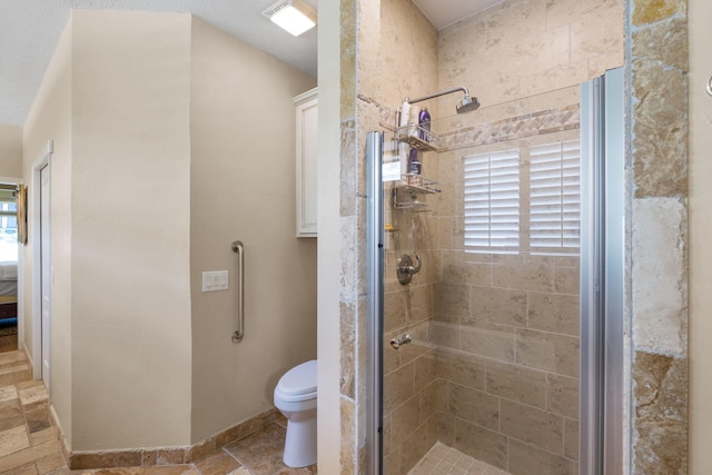 1124 Willowood Cir, Gulf Breeze, FL 32563 - bathroom with toilet, a shower stall, and a healthy amount of sunlight