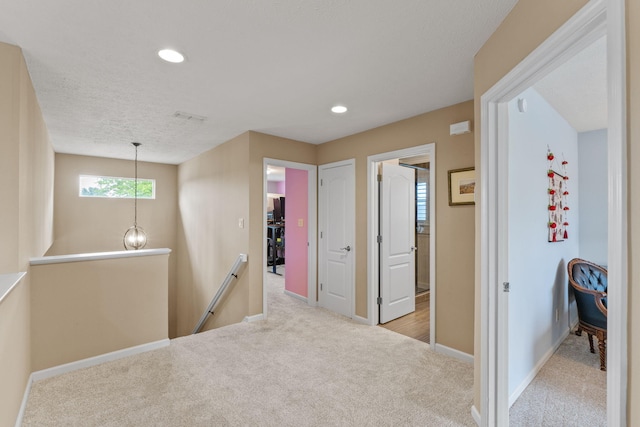 1124 Willowood Cir, Gulf Breeze, FL 32563 - hallway featuring baseboards, an upstairs landing, carpet, and recessed lighting