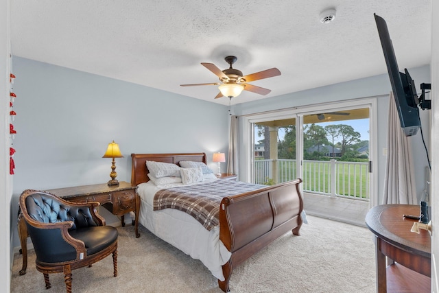 1124 Willowood Cir, Gulf Breeze, FL 32563 - bedroom featuring a ceiling fan, carpet floors, access to outside, and a textured ceiling