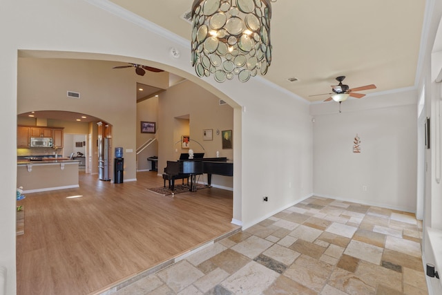 1124 Willowood Cir, Gulf Breeze, FL 32563 - foyer with visible vents, crown molding, and ceiling fan