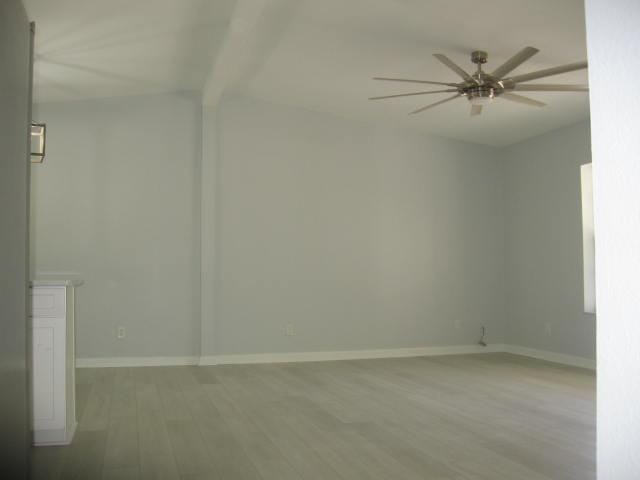 13 Plantation Way, Santa Rosa Beach, FL 32459 - unfurnished room featuring beamed ceiling, baseboards, wood finished floors, and ceiling fan