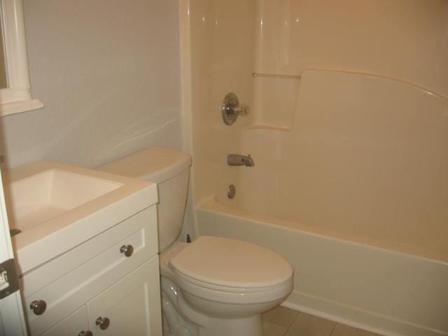 13 Plantation Way, Santa Rosa Beach, FL 32459 - bathroom featuring tile patterned floors, washtub / shower combination, vanity, and toilet