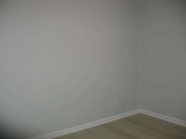 13 Plantation Way, Santa Rosa Beach, FL 32459 - unfurnished room with wood finished floors and baseboards