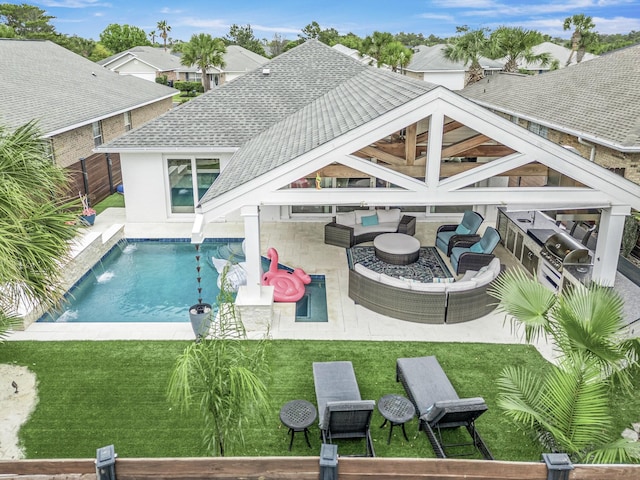 52 Secret Harbor Dr, Miramar Beach, FL 32550 - back of property featuring outdoor lounge area, roof with shingles, a patio area, and an outdoor pool