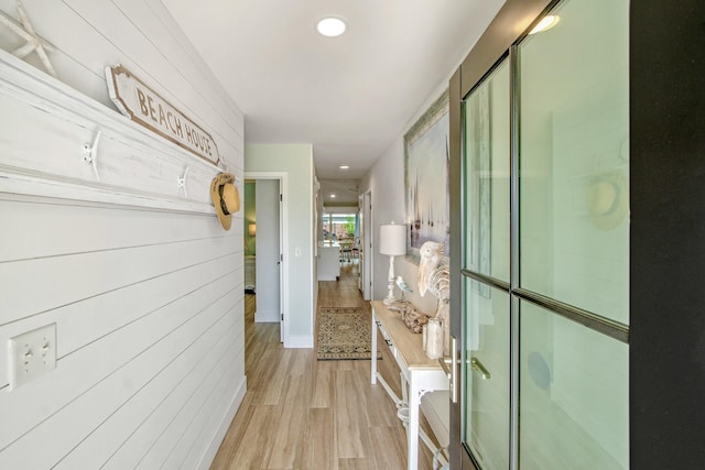 52 Secret Harbor Dr, Miramar Beach, FL 32550 - hall with light wood-style flooring, recessed lighting, baseboards, and wood walls