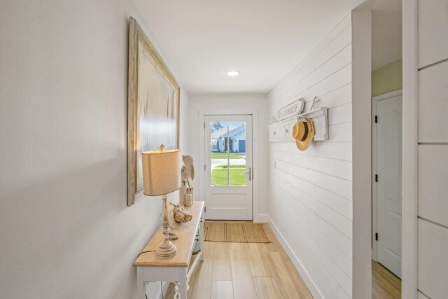 52 Secret Harbor Dr, Miramar Beach, FL 32550 - doorway to outside with light wood-style flooring, baseboards, and recessed lighting