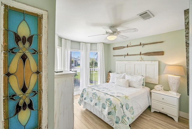 52 Secret Harbor Dr, Miramar Beach, FL 32550 - bedroom featuring light wood-type flooring, a ceiling fan, and baseboards