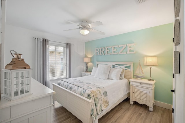 52 Secret Harbor Dr, Miramar Beach, FL 32550 - bedroom with wood finished floors, baseboards, and ceiling fan