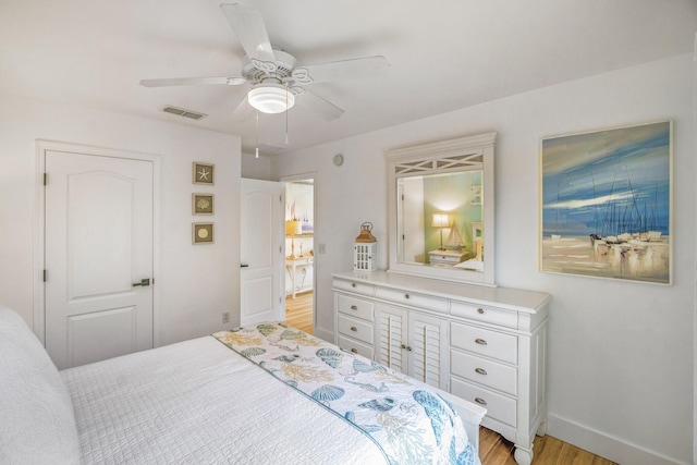 52 Secret Harbor Dr, Miramar Beach, FL 32550 - bedroom featuring light wood-style floors, baseboards, and a ceiling fan