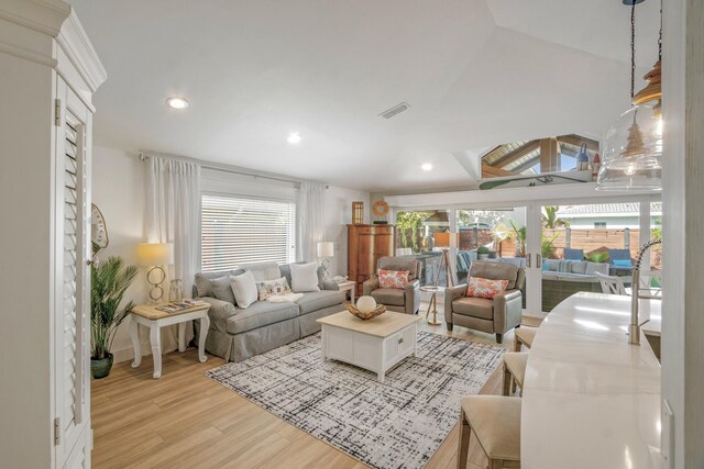 52 Secret Harbor Dr, Miramar Beach, FL 32550 - living room with plenty of natural light, light wood-style flooring, french doors, recessed lighting, and vaulted ceiling