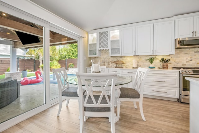 52 Secret Harbor Dr, Miramar Beach, FL 32550 - dining room with light wood finished floors