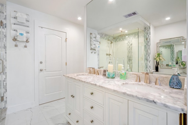 52 Secret Harbor Dr, Miramar Beach, FL 32550 - bathroom featuring a marble finish shower, recessed lighting, double vanity, and marble look tiles