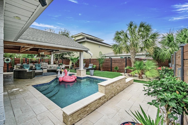 52 Secret Harbor Dr, Miramar Beach, FL 32550 - view of swimming pool featuring an outdoor living space, a patio area, a fenced backyard, and an outdoor kitchen