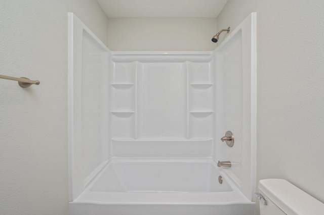 full bathroom featuring shower / bathing tub combination and toilet