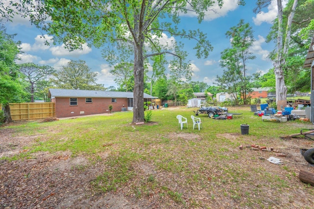 view of yard featuring fence