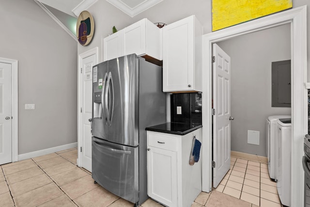 kitchen with stainless steel fridge with ice dispenser, light tile patterned floors, white cabinetry, electric panel, and washer and dryer