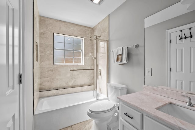 full bathroom with vanity, tile patterned flooring, visible vents, toilet, and shower / bathing tub combination