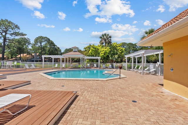 pool featuring a patio area, a gazebo, fence, and a pergola