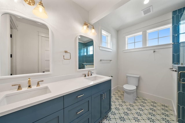 272 Beach Bike Way, Seacrest, FL 32461 - bathroom featuring double vanity, tile patterned floors, toilet, baseboards, and a shower with door