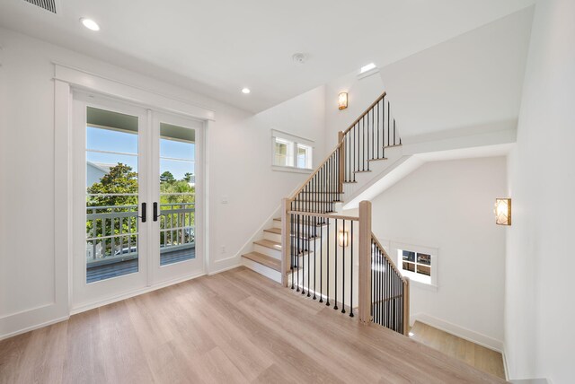 272 Beach Bike Way, Seacrest, FL 32461 - stairway with wood finished floors, recessed lighting, and baseboards