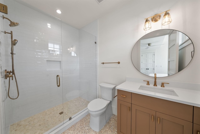 272 Beach Bike Way, Seacrest, FL 32461 - full bathroom with speckled floor, a shower stall, toilet, vanity, and recessed lighting
