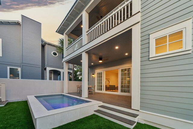 272 Beach Bike Way, Seacrest, FL 32461 - pool at dusk featuring an outdoor hot tub