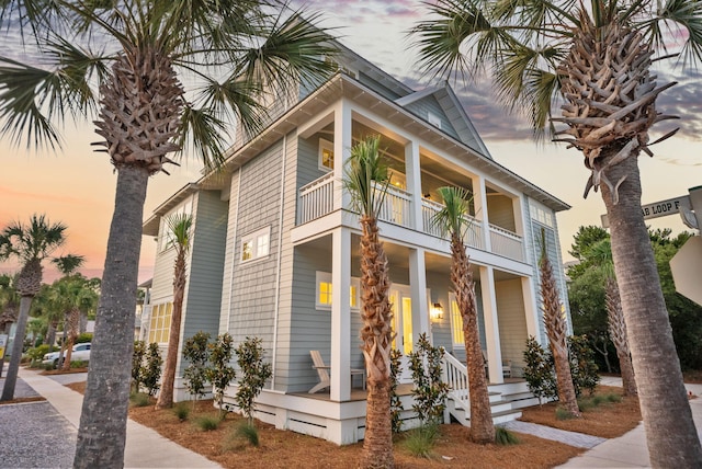 272 Beach Bike Way, Seacrest, FL 32461 - view of side of property with a balcony and a porch
