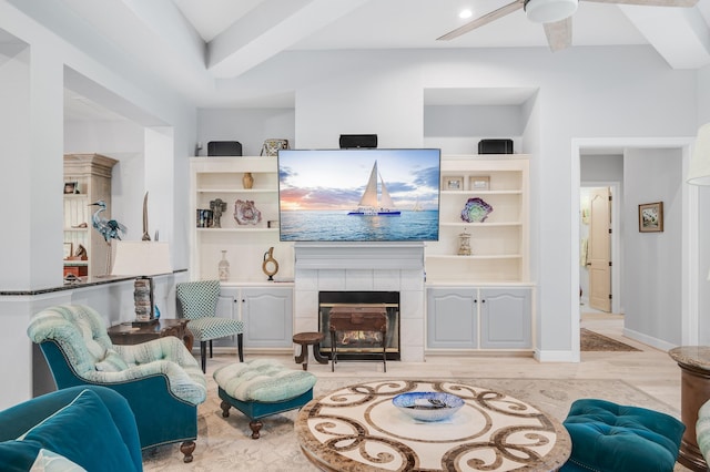 21 S Anchors Lake Dr, Santa Rosa Beach, FL 32459 - living area featuring a tiled fireplace, light wood-type flooring, and a ceiling fan