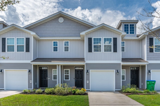 175 E Iron Horse Dr, Crestview, FL 32539 - view of property with an attached garage and driveway