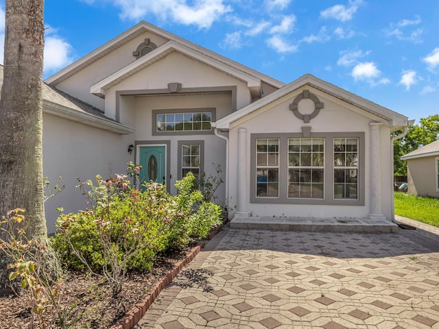 27 Hidden Harbor Ln, Miramar Beach, FL 32550 - entrance to property with stucco siding