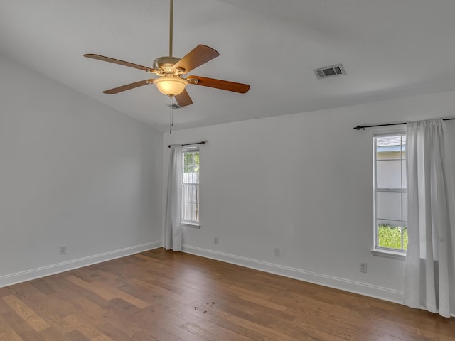 27 Hidden Harbor Ln, Miramar Beach, FL 32550 - unfurnished room with a ceiling fan, baseboards, and wood finished floors