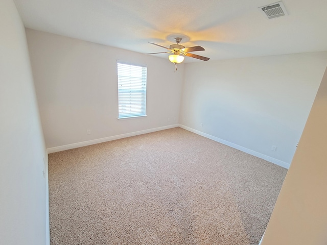 1921 Mooring Dr, Navarre, FL 32566 - carpeted empty room featuring a ceiling fan and baseboards