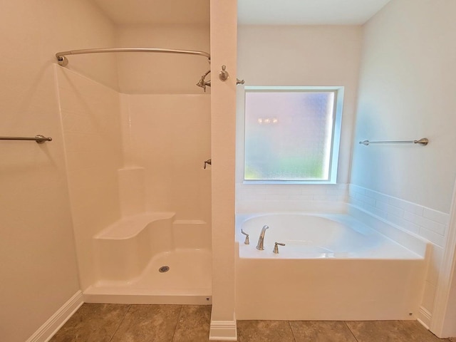 1921 Mooring Dr, Navarre, FL 32566 - full bathroom featuring a shower, a bath, and tile patterned flooring
