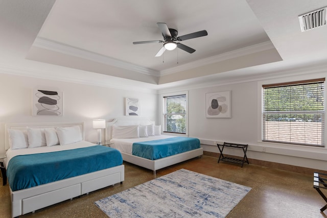 bedroom with a ceiling fan, visible vents, ornamental molding, and a raised ceiling